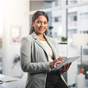 Young female professional holding clipboard
