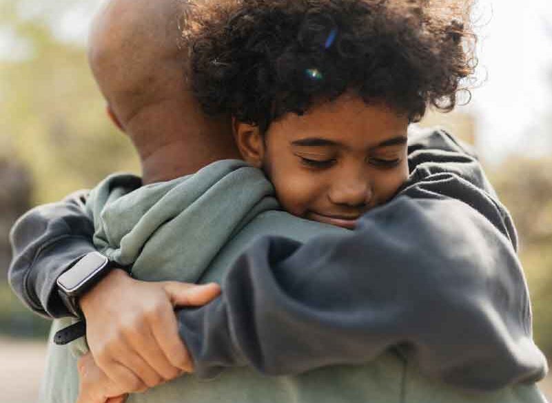 Boy Hugging Dad 800x800